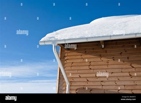 Wooden House Covered By Snow Stock Photo Alamy