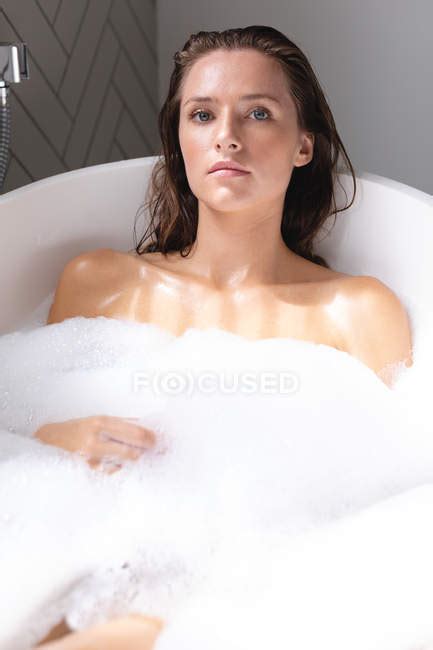 Close Up Of Beautiful Woman Bathing In The Bathtub In Bathroom Home