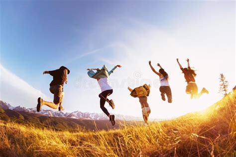 Group Happy Friends Mountains Sunset Raised Arms Stock Photo Image Of