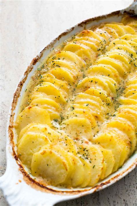 I love my flat whisk for this. Classic Parmesan Scalloped Potato Recipe - Verbal Gold Blog
