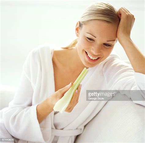 Woman Eating Celery Photos And Premium High Res Pictures Getty Images