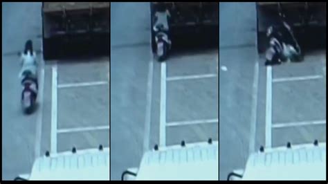 Woman Is Knocked Out Cold As She Smashes Into The Back Of A Lorry While Checking Her Phone As