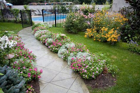 Along The Sides Of A Walkway Is A Great Place For A Line Of Flowers A