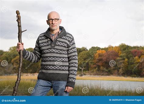 Mature Man Holding A Stick Stock Image Image Of Bald 36095419