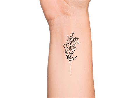 Dainty Flower Tattoo Ideas Photos