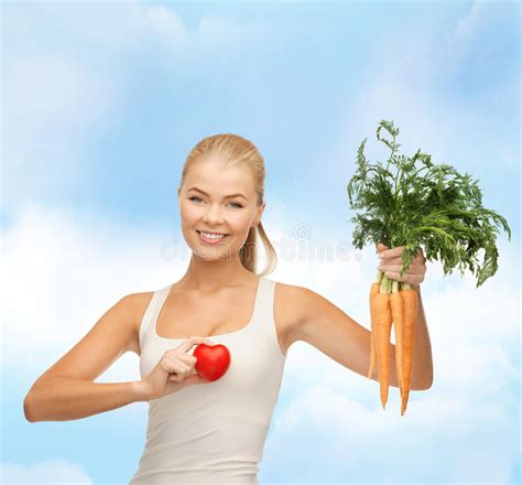 Smiling Woman Holding Heart Symbol And Carrots Stock Image Image Of
