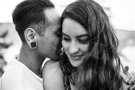 Intimate Photo Of Man Whispering In Womans Ear By Leah Flores
