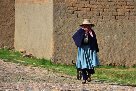 Quechua Woman Walking On The Road Near Vacas Cochabamba Bolivia