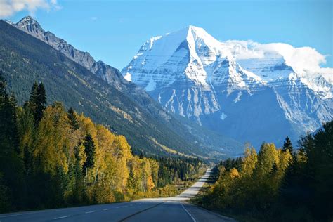 Wallpaper Id 212534 A Road Leading Towards A Snow Covered Mountain