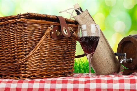 Picnic Basket And Wine Botle On The Table With Sack Cloth Stock Image