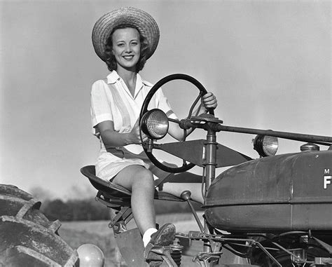 Woman On Tractor Photograph By George Marks Pixels