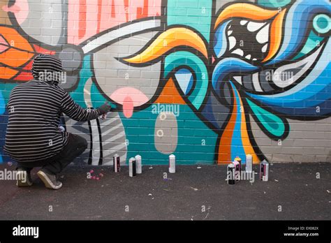 Graffiti Street Artists Paint A Mural In Australia Stock Photo Alamy
