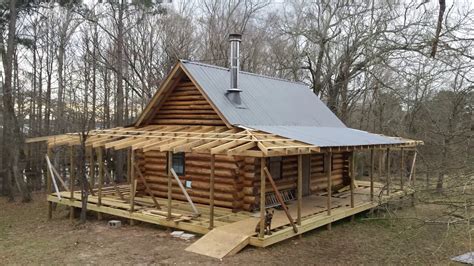 Off Grid Log Cabin Build 25h Sheet Metal Porch Roof Youtube