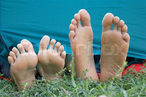 Two Peoples Feet Sticking Out Of Tent Stock Image Colourbox