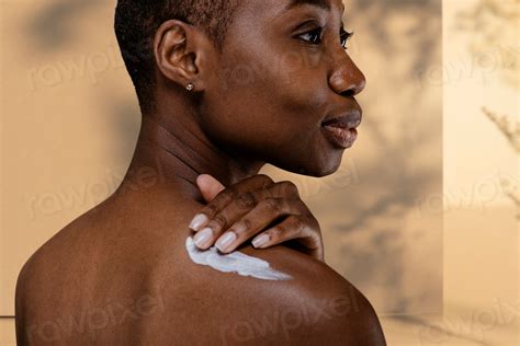 Black Woman Applying Body Cream Premium Photo Rawpixel