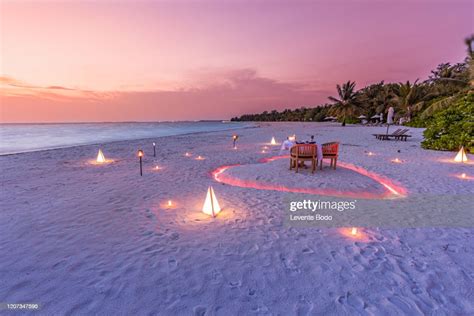 Luxury Honeymoon Destination Romantic Dinner With Candles Heart On The Calm Sand Beach Landscape