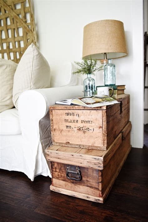 Your rustic living room need not be all classic this fall as adding modern touches to it is absolutely acceptable. Living Room Makeover - Stacked Trunk End Table - Liz Marie ...
