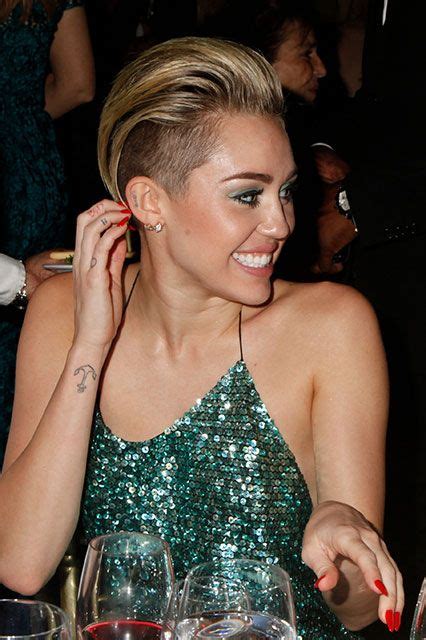 Best Miley Cyrus Tattoo Designs Meanings And Photos