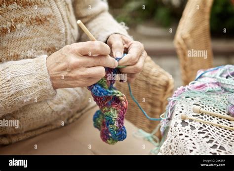 Hands Of Old Woman Knitting Wool Close Up Stock Photo Alamy