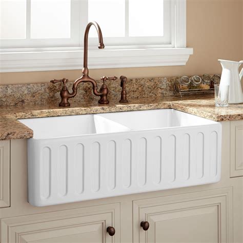 Consider the fact that your cabinet itself will support the farmhouse sink, unlike a traditional sink which is mostly supported by the benchtop as well as the. 33" Northing Double-Bowl Fireclay Farmhouse Sink - White ...