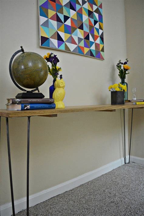 Your doorway is not only the first thing visitors to your home will see, but it is often the hub of morning activity in a home. DIY Hairpin Leg Entryway Table by A Joyful Riot - Modern Legs
