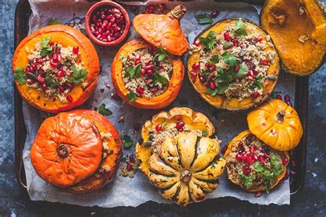 vegan stuffed roasted pumpkins with quinoa and pomegranate