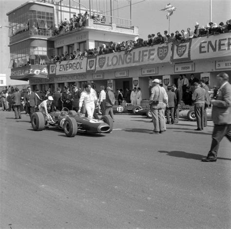 Welcome to the circuit paul ricard in le castellet, france for the french grand prix! Jack Brabham pushes the Brabham BT19 Repco through the pit ...