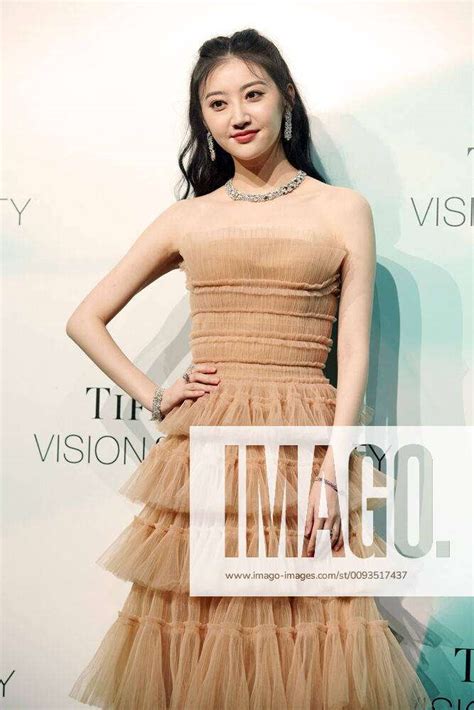 Chinese Actress Jing Tian Wears A Nude Color Dress Attending The