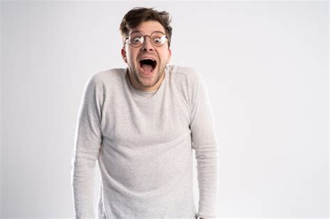 Premium Photo Man With Glasses With Shocked Amazed Expression
