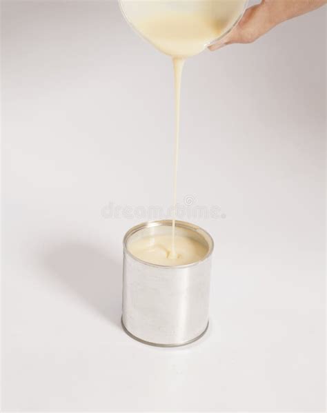Man Hand Pouring Condensed Milk Tin Can Stock Photos Free And Royalty