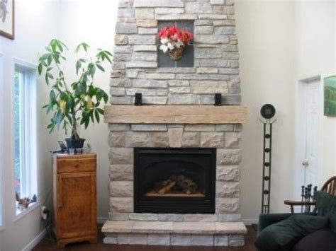 Elegant family room photo in vancouver cut out on the floor? Stone Walls & Fireplaces | ROBIN AGGUS - Natural Landscaping