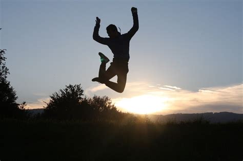 Young Man Jump Against The Evening Sky Free Image Download
