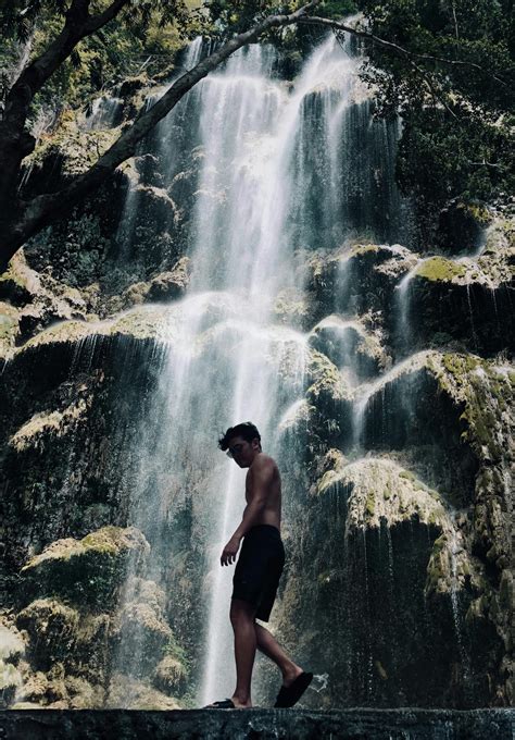 Man Standing Near Waterfall · Free Stock Photo