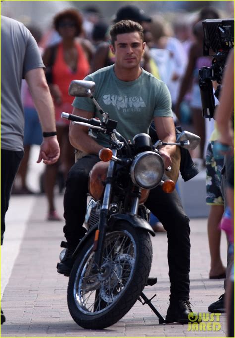 Zac Efron Shows His Muscles On A Motorcycle For Baywatch Photo
