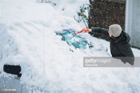 Scraping Ice Off Windshield Photos And Premium High Res Pictures