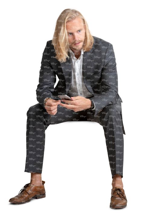 man in a suit sitting - VIShopper