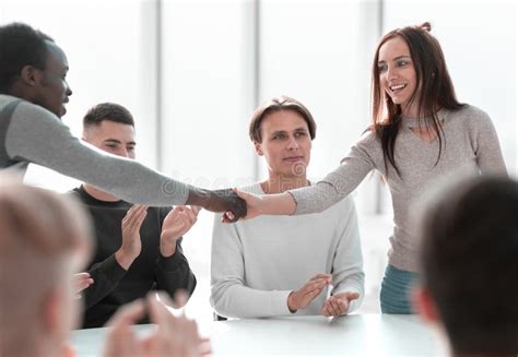 Young People Greet Each Other At A Group Meeting Stock Image Image Of