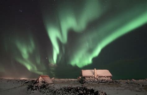 Aurora Borealis Over Cabins In Iceland Photo One Big Photo