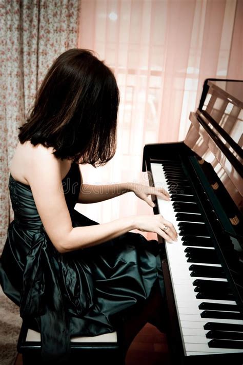 Woman Playing Piano Stock Image Image Of Education Indoors 12506751