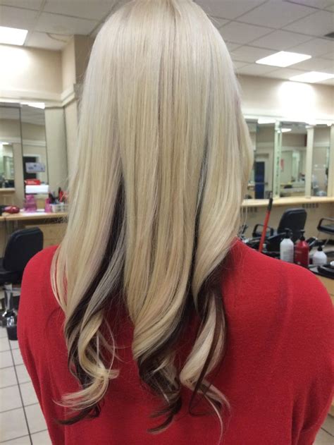 Shiny and luscious pouring down your back. Blonde with a rich red brown underneath. Hair by Samantha ...