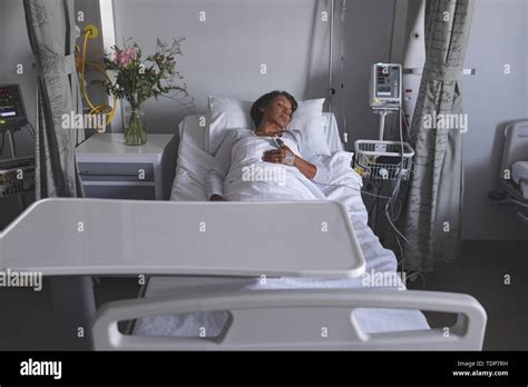 Female Patient Sleeping On Bed In The Ward At Hospital Stock Photo Alamy