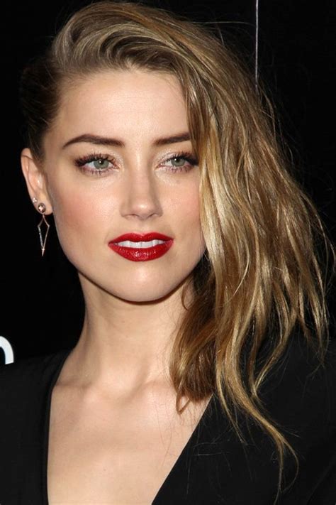 amber heard wears her hair tight on one side for a faux undercut—and i think we can pull this