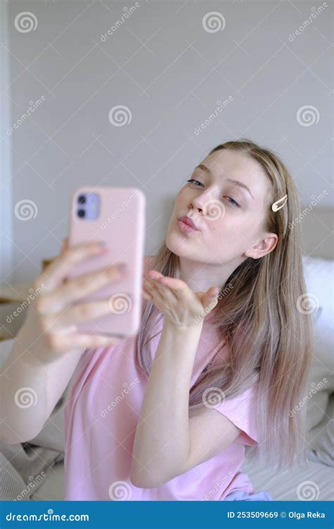 Cute Girl 15 18 Years Old Sitting On The Bed Makes A Selfie Stock Image Image Of Lifestyle