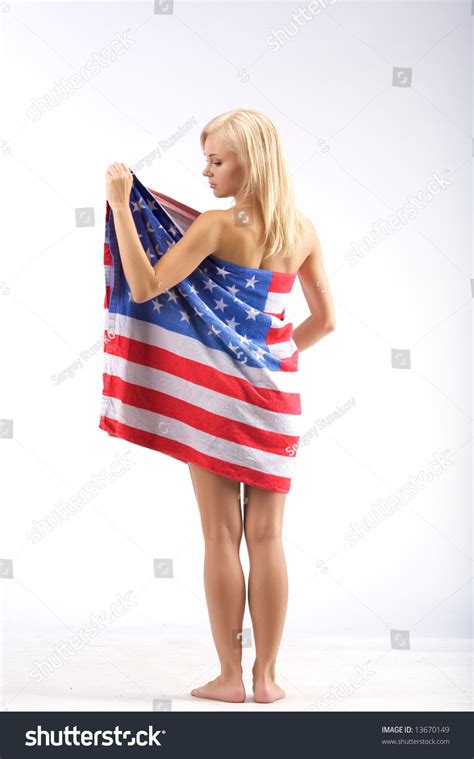 Naked Girl In American Flag Stand On A White Backgrund Stock Photo