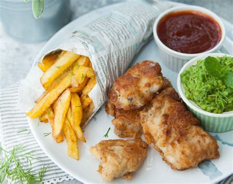 Crispy battered fish with golden chips are surprisingly easy to make yourself. Fish & Chips with Mushy Peas | Foodist