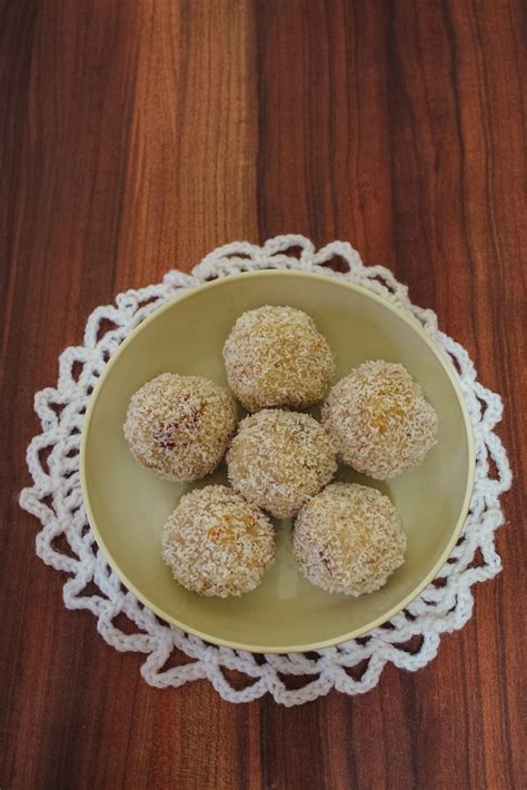 Firstly, take 1 cup seedless dates in a blender and blend to coarse. Coconut Ladoo Recipe (With Condensed Milk) - Spice Up The ...