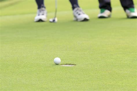 Golf Ball On The Edge Of Hole Stock Photo Image Of Challenge Copy