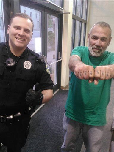 Police Officer Takes Photo With Man With Cops Suck Tattoo