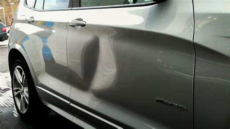 Door Dents And 3 Benefits Of Paintless Dent Removal