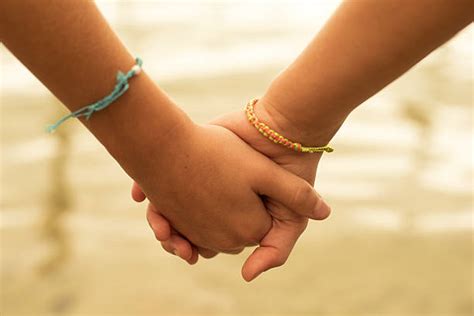 Sisters Holding Hands Stock Photos Pictures And Royalty Free Images Istock